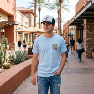 Young man wearing the white and black ZOYO Keep It Cool trucker hat