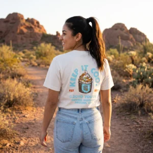 Woman wearing the bone white ZOYO x State 48 T-Shirt on a desert trail in Papago Park, Phoenix